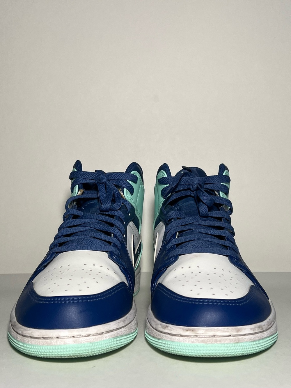 Air Jordan 1 Mid Sneakers in Navy Blue and Mint